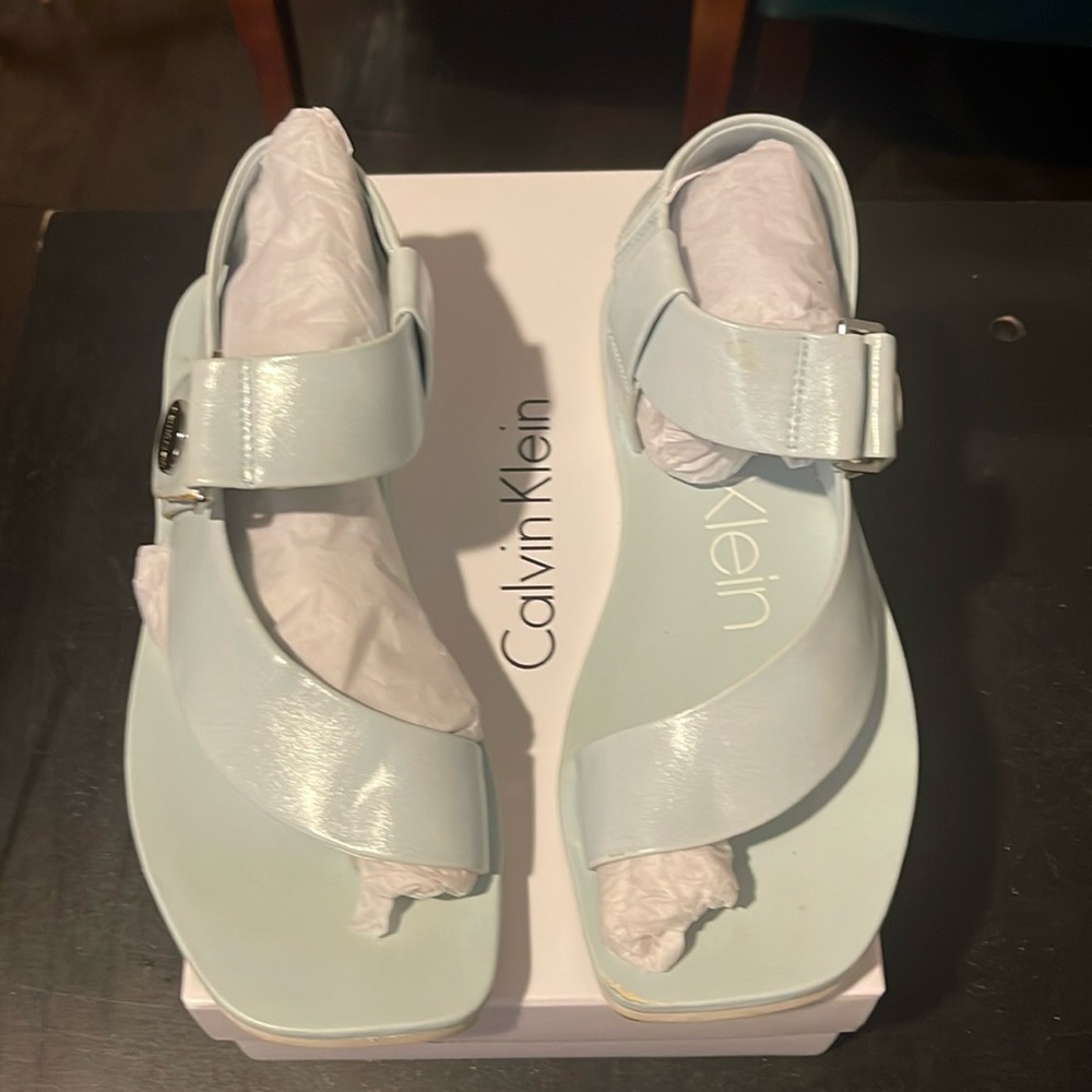Calvin Klein Light Blue Flat Sandals.